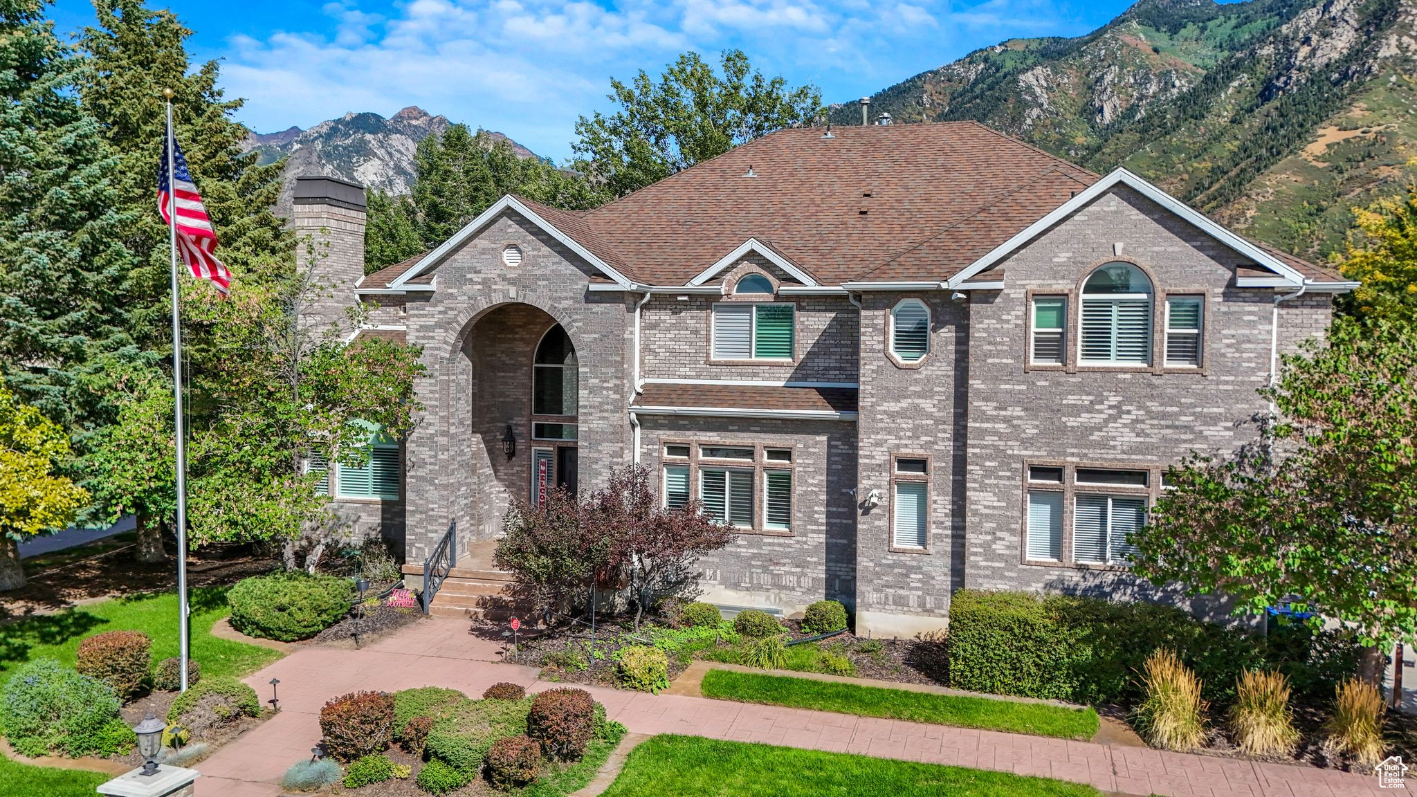 Welcome to this stunning residence located in the highly sought-after, exclusive 24-hour guard-gated Pepperwood community. Step inside and immediately feel at home-a space designed to de-stress, relax, and rejuvenate. Interior Features: Expansive vaulted ceilings and oversized windows that flood the home with natural light Four primary bedroom suites, including: Main level master suite Vaulted grand master suite upstairs with fireplace, attached office, large laundry room, breakfast center, refrigerator/freezer drawers, microwave, and natural stone heated tile flooring Basement primary suite offering privacy and comfort for guests or family New oversized gourmet kitchen featuring: Wolf appliances: double ovens, microwave, gas cooktop with griddle, pot filler, and warming drawer Subzero refrigerator + two island freezer drawers Two dishwashers, two sinks, and a breakfast center Extra-large island and walk-in pantry Hardwood flooring throughout Main level office Walkout lower level with mother-in-law style setup: Large family room, second full kitchen with oversized island, double ovens, gas cooktop, and microwave Amazing theater room for a true home cinema experience Generac generator for peace of mind Outdoor Living: Gated yard with RV parking Spacious backyard retreat with spectacular mountain views Multiple entertaining areas including a waterfall feature, walking path, and gathering spaces Community Amenities (Over 475 Acres): Scenic bike/walking paths Pool with lifeguards and competition swim team Splash pad, large hot tub, pavilion with restrooms Tennis courts, pickleball, basketball, sand volleyball Playground, large park, food truck nights, and on-site property manager Location Highlights: Minutes from world-class ski resorts (Snowbird, Alta, Park City) Endless hiking and biking trails nearby Quick access to lakes, recreational facilities, shopping, and the international airport Learn more about Pepperwood https://engage.goenumerate.com/s/ppw/home.php