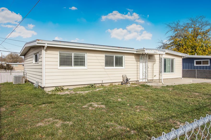 ** Brand New Water Heater ** Beautifully updated single-level rambler featuring 4 bedrooms and 2 bathrooms, including a private master bathroom. This home offers an open, functional floor plan and installed lighting with energy-efficient LED fixtures, fresh interior paint, and flooring throughout. The kitchen has been upgraded with custom cabinets that offer plenty of storage, waterproof flooring, quartz countertops, and modern finishes-perfect for everyday living and entertaining. Enjoy long-term energy savings with solar panels. The home also includes an oversized detached 2-car garage; Part of the garage has a partial framed-in wall as the owner began creating a studio-style space but did not finish, the project - providing the flexibility to complete for the next owner or tearing down the wall in the garage can easily be converted into a 4-car garage, providing ample space for vehicles, storage, or a workshop. Fully Fenced Property Situated in a centrally located and highly desirable area, this property offers convenient access just 15 minutes to Downtown Salt Lake City and the airport, with shopping, schools, parks, and major commuter routes. With its modern updates and move-in-ready condition, this home is an excellent opportunity for buyers looking for quality and comfort on one level. Buyer and buyer's agent to verify all information. Please schedule showings with Aligned Showings. Square footage figures are provided as a courtesy estimate only and were obtained from County Records. Buyer is advised to obtain an independent measurement.