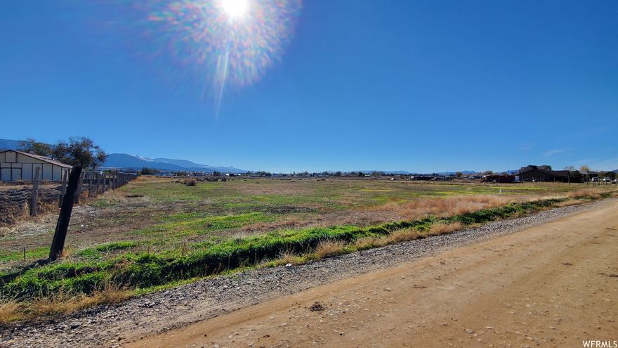 5 acre lot in neighborhood (Little Eden Subdivision) of 5 acre lots. Includes 2 acre feet of water. Well is owned 50% with neighbor to the north, stubbed to property line. Electric and gas both available to property.