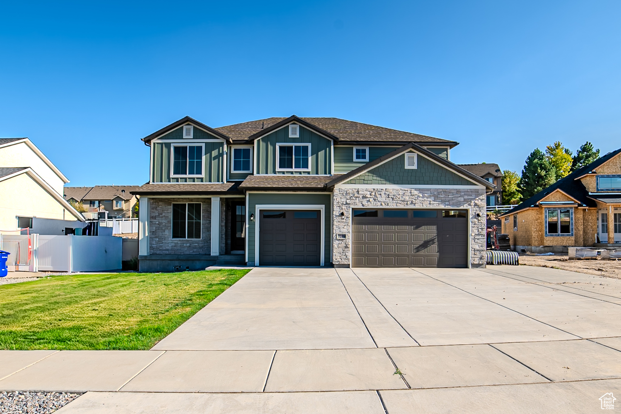 The Witzel Floorplan with a two-story vault living room and a main level suite this home is an open and spacious concept. Large designer kitchen with custom pulls, plumbing, and stainless steel appliances. Laminate hardwood, upgraded carpet, designer wall finishes.
