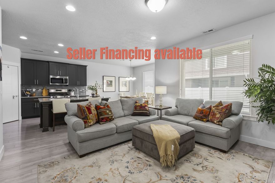 SELLER FINANCING AVAILABLE...Welcome to this beautifully maintained move-in ready townhouse offering an inviting open floor plan and an abundance of natural light throughout. The spacious main level features seamless flow between the living, dining, and kitchen areas-perfect for entertaining or everyday living. Upstairs, you'll find generously sized bedrooms, each complete with large walk-in closets for plenty of storage. The primary suite provides a comfortable retreat, while additional bedrooms offer flexibility for guests, a home office, or a workout space. Enjoy the ease of low-maintenance living in a well-kept community known for its friendly atmosphere and convenient location. Close to shopping, dining, parks, and top-rated schools, this home offers both comfort and convenience.  Key Features:  Move-in ready with open-concept design  Bright, spacious interior with modern finishes  Large walk-in closets in every bedroom  Excellent neighborhood with nearby amenities  Easy access to major routes and local attractions  This home is ready for you-just unpack and settle in!