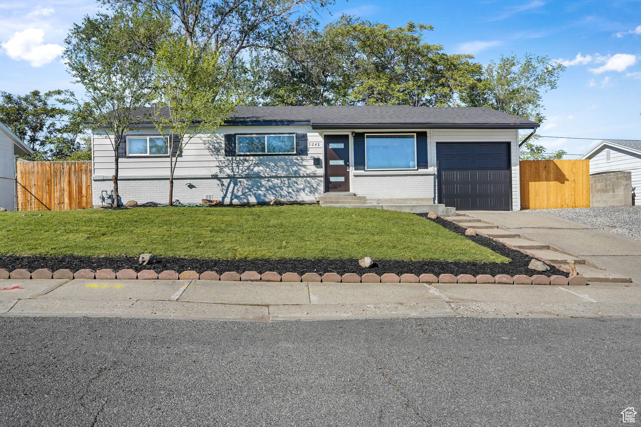 Nicely updated 6 bedroom home with 2 full bathrooms. The kitchen has ss appliances and new granite counter top, new sink and disposal. The kitchen has tile floor. New LVP flooring and new carpet. New interior and exterior paint. Both bathrooms have tile surrounding the tubs with new vanities and hardware. The furnace and A/C are both new. Large bedrooms with double pane Egress windows in all 3 basement bedrooms, with a large family room. Plenty of room in this home. Large fenced back yard. Clean and ready to move in shows a 10 plus.