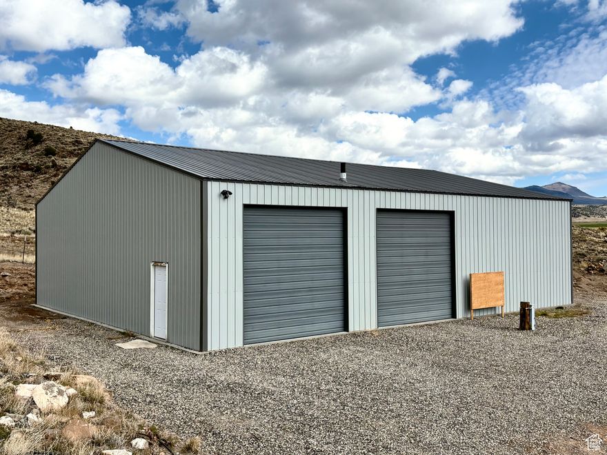 4.07 Acres | 3,000 sq ft Insulated Shop | RV Hookups | Fiber Internet | Build-Ready |  Experience rural comfort and modern utility on this beautiful 4.07-acre property in Fremont, Utah. With full utilities, a high-end insulated shop, and ready-to-use RV hookups, this property offers everything from workshop and storage potential to an ideal base for your future home build.   Property Highlights:  Culinary water meter installed (valued at $15,000). Option to purchase irrigation water shares for additional water access.   Fiber internet at the property for high-speed, reliable connectivity.  1750-gallon septic tank already in place.   200-amp electrical service to the shop with an additional 100-amp line feeding the RV pad - ideal for two 50-amp RV hookups.   Full RV hookups with power, water, septic, propane, and Wi-Fi - ready for year-round use. Shop Details (50' x 60', 3,000 sq ft):  2x6 all-metal construction with R-30 closed-cell spray foam insulation - maintains around 50F inside all winter without active heating.   Two 12' x 12' insulated roll-up doors and 220v power plus 110v outlets every 5 feet.  Bathroom plumbing roughed-in and framed, ready to be finished.    Efficiently heated by a smart Wi-Ficontrolled pellet stove that warms the entire shop from 50 to 70F in about an hour.  Large wood stove installed as a backup heat source (hasn't been needed since insulation was completed).   6" thick concrete pad with footings in the bay designed for lift use.   12,000 lb 2-post car lift - currently excluded in the sale, but if desired will be considered with any reasonable offer.    Divided layout: 40' x 50' shop area and 20' x 50' framed living quarters - ready for your finishing touch. Additional Features:   Private access via a newly built bridge.   Trail access directly from the property for ATV riding, hiking, or exploring the Fremont countryside.  Includes detailed build plans for a 2-bedroom, 1-bath home with a large loft living space - perfect for turning the property into a full-time residence or vacation retreat. This property combines the peace and privacy of rural living with the convenience of modern infrastructure. Whether you're looking for a workshop, an RV basecamp, or a ready-to-build homestead, 475 N Ledge Rd offers endless possibilities.