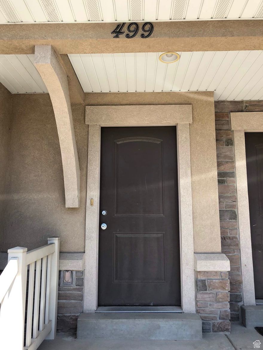 Spacious 4-bed, 3.5-bath townhome in a prime Orem location near UVU, I-15, shopping, and dining. The open main level features vaulted ceilings, a bay window, and a bright family room. The kitchen offers ample cabinetry, great counter space, and a closed pantry. Upstairs includes a primary suite with walk-in closet and shower, plus two more bedrooms. The finished basement adds a second family room, fourth bedroom, and full bath-ideal for guests or rental potential. Includes two parking spots, a community park, and low-maintenance living with HOA-covered hazard insurance, water, sewer, trash, and snow removal. Recent updates include a brand-new roof and exterior HVAC condenser installed by the HOA.