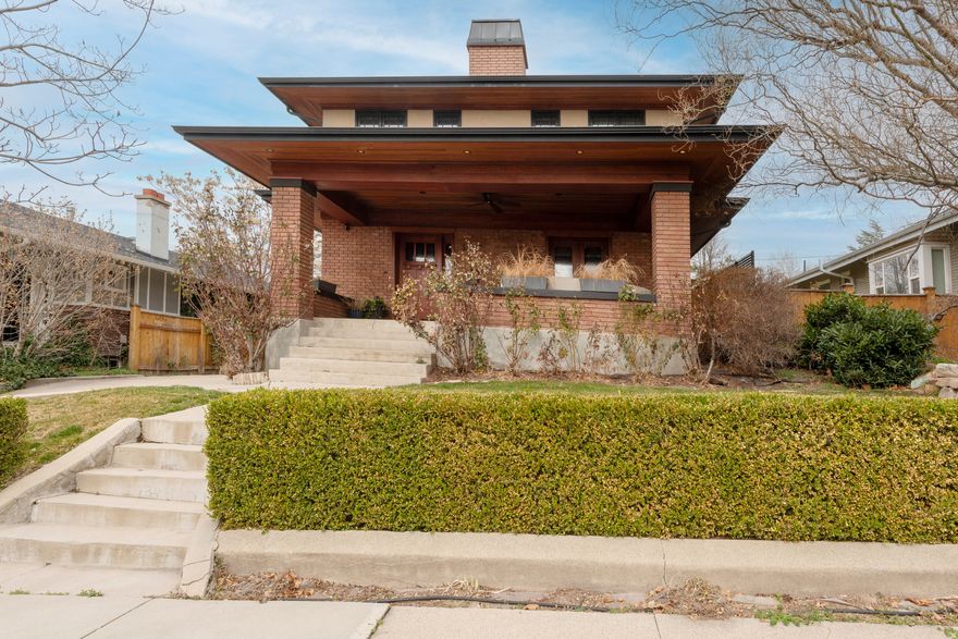 Absolutely stunning remodeled two-story showcasing exceptional 1920s Arts & Crafts architecture. Period-appropriate woodwork throughout includes a built-in bookcase, beamed ceilings, and classic wood columns that highlight the home's historic character. The beautifully designed custom kitchen features shaker-style quarter-sawn white oak cabinetry, granite countertops, tile backsplash, and high-end lighting. True divided light Sierra Pacific windows bring in abundant natural light. The open main-floor living, kitchen, and dining areas create an inviting space, with French doors leading to a spacious front sitting porch and a back deck perfect for entertaining.  A sweeping staircase filled with windows adds architectural drama and light. Upstairs offers an excellent floor plan with a lovely primary suite featuring its own fireplace and a spacious, tastefully designed bath with soaking tub, large walk-in shower, and heated floors. A convenient upstairs laundry room includes built-in cabinetry and a utility sink.  The basement boasts high ceilings, a comfortable family room, two additional bedrooms, and a large bathroom. All basement rooms include egress windows. Professionally decorated throughout. Additional features include a new garage with attic storage. Located just half a block from the vibrant 15th & 15th district, with a neighborhood bakery, wine bar, Italian deli, gelato shop, bookstore, and beloved local restaurants.  Homes with this level of craftsmanship and quality rarely come on the market.