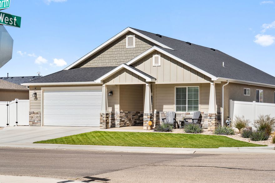 Better than new! Stunning home near community park, fabulous open floor plan, with a spacious kitchen, inviting great room with a fireplace, that opens to an amazing and fully fenced backyard. RV parking on the side. Generous primary bedroom, separate shower and soaker tub in the primary bath. Split floor plan conveniently provides two additional bedrooms. And check out the unobstructed mountain views!