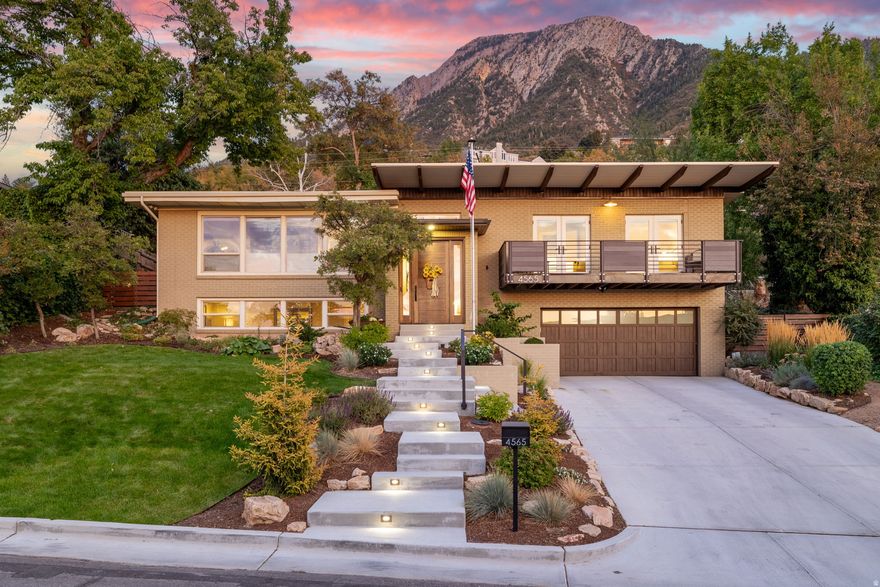 Step into a dream in the highly coveted Olympus Cove neighborhood!  Thoughtfully updated, this home is an indoor-outdoor sanctuary and the essence of move in ready.  Front windows boast incredible views of the Salt Lake valley and sunsets every night.  The backyard offers a year around retreat with spacious covered patio area, brand new kitchenette, fire-pit, ceiling heaters and mature landscaping.  The expanded front entrance gives an elevated feel from the moment you walk in the front door. Home has been beautifully upgraded with quality finishes throughout; hardwood floors, quartz countertops and chef's kitchen appliances.  Primary suite has been expanded to include walk in closet with washer & dryer, expansive bathroom with heated floors and private deck overlooking the Salt Lake valley. Front concrete driveway, staircase and landscaping are all newly completed!  Whether you are looking for a safe haven to relax every day or a hosting space to bring loved ones together, this home has it.  Pristinely located with incredible access to countless hiking and biking trails, world-class skiing, downtown shopping & dining and Salt Lake International Airport.  This home is the perfect blend of comfort, luxury and convenience that you won't want to miss!