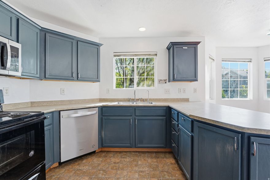 Location, location, location! This darling condo is tucked away in a quiet neighborhood surrounded by mature trees and stunning mountain views. Enjoy being within walking distance to local favorites like Fat Cats, Smith's Grocery, Swig, and countless restaurants and shops. Conveniently located near Redwood Road and Bangerter Highway, making it easy to travel north, south, east, or west with ease. Inside, you'll love the freshly painted kitchen cabinets that give the space a fun, updated feel. This spacious three-bedroom condo offers ample storage and an open floor plan perfect for entertaining. Just in time for summer, the community pool is open and ready for you to enjoy! Don't miss this opportunity - this home is priced to sell.
