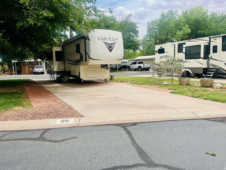 Beautiful long lot with mature shade trees and lush grass, ideally located near the pool and clubhouse. Enjoy the paver patio--perfect for relaxing or entertaining. Community offers fun activities and amenities. Owner is open to long-term rental at $650/month. Buyer to verify all information.