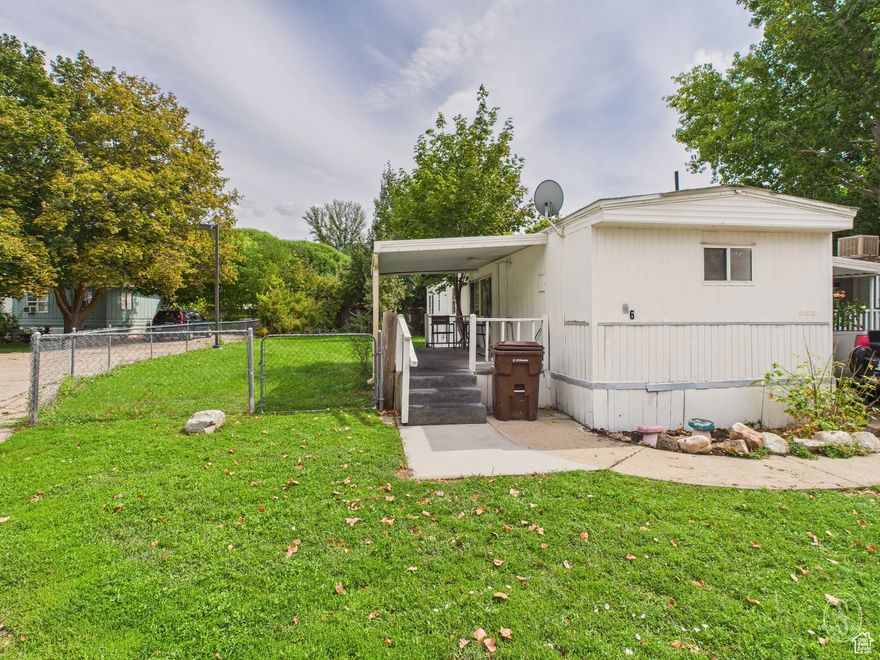 Nicely updated manufactured home with a LARGE FULLY FENCED YARD, covered patio and a carport. This 2-bedroom / 1 bath home has lot rent under $1,000, which is getting harder to find. Great area with plenty of trees.