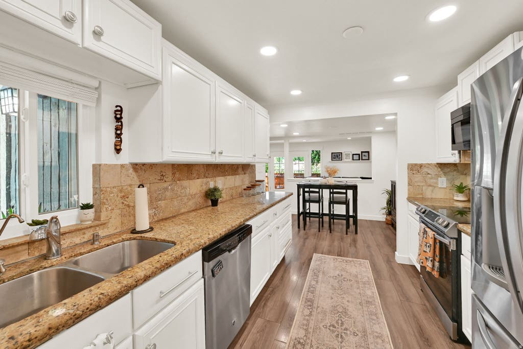 Photo of 4181 S VILLAGE LN #C, Taylorsville, UT 84129 (MLS # 2180615)