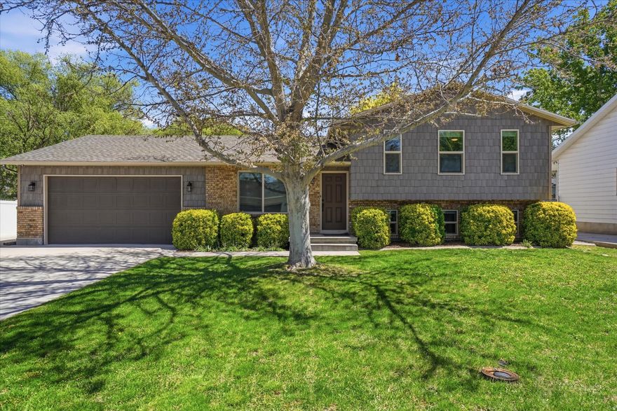 Experience the perfect blend of comfort and convenience in this beautifully maintained, third-owner home that has been meticulously kept inside and out. This move-in-ready gem offers an expansive outdoor oasis featuring a massive carport, an oversized garage, and a large storage shed, providing unrivaled parking and storage for all your vehicles and outdoor toys. The interior is equally impressive, boasting four spacious bedrooms and a cozy family room anchored by a warm fireplace, along with fully updated kitchens, bathrooms, and bedrooms throughout. Whether you are enjoying the stunning mountain views from the yard or taking advantage of the prime central location near major shopping, dining, and easy commuting routes, this property truly offers the best of both worlds with its rare balance of private serenity and urban accessibility.
