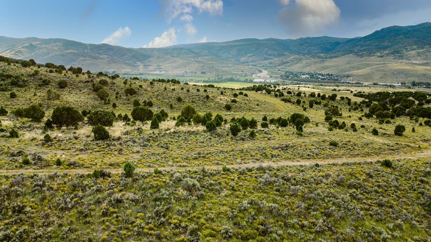 Public Remarks: Proudly Introducing The Ridge at Cherry Canyon - A brand new, private luxury community nestled in the foothills of Wanship in scenic Cherry Canyon, a mere ten minutes from Park City. Surrounded by protected open space, this premium mountain oasis boasts 360 degree mountain and valley views of the peaceful Weber River, the Park City mountains, and even Mount Timpanogos on the far horizon. Come see and feel the breathtaking beauty of this hidden gem in person, it is a sight to behold. Only one I-80 exit east of Promontory, minutes from Blue Sky and The High West Distillery, and only 45 minutes to the SLC International Airport or downtown SLC, The Ridge at Cherry Canyon will quickly become one of the most premiere residential destinations in Summit County and Northern Utah. Convenient and quick access to every modern convenience of city life, yet tucked away in its own secluded haven. Build your dream home on this spacious and pristine 2.43 AC mountain estate. With protective covenants and an architectural review committee to preserve value and quality, this community is designed to enhance every bit of healthy, fresh air living. Connected to over 10 miles of private, non-motorized hiking or equestrian trails in Cherry Canyon providing therapeutic recreation and exercise right out your back door in a quiet mountain setting, with easy access to the rail trail, Weber River, and Rockport or Echo Reservoirs. Reach out today to schedule your private tour. Info herein deemed reliable but not guaranteed. Buyer/buyer agent to verify all.
