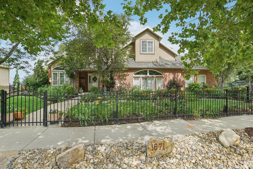 VIEWS, VIEWS, VIEWS! This home is a lifestyle. Perched above the South Mountain Golf Course, this beautifully maintained Draper home blends panoramic views with lush perennial gardens for an unforgettable living experience. The masterfully landscaped yard features a waterfall, mature trees, and a show-stopping garden that has been lovingly tended by the owners. Step inside to vaulted ceilings, a bright kitchen with new appliances, a cozy family room with fireplace, and formal living and dining spaces. The expansive deck outside the kitchen is a front-row seat to valley sunsets, holiday fireworks, and the Oquirrh Mountains. Upstairs, you'll find spacious bedrooms, a well-appointed owner's suite with panoramic windows, a generous bath, and a walk-in closet. Downstairs, a separate apartment with its own entrance provides income potential or multigenerational living, plus a dedicated craft room. With an oversized 734 sq ft 3-car garage, newer roof (2023), and dual HVAC systems (2022), this home delivers space, style, and value-all just steps from Corner Canyon trails. Did we mention 2 extra-large custom sheds. Close to Juan Diego Private School and Public school transportation pickup is right down the street. With a premium lot, this home is a MUST SEE!