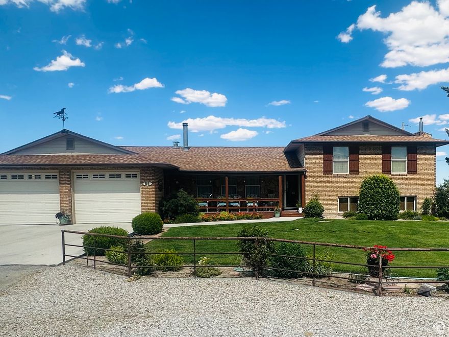 Welcome to your dream property in Ferron, Utah! Nestled on 3.59 beautifully maintained acres across 3 parcels (05-0082-0024, 01-113D-0015 & 05-0082-0022), this spacious 4-bedroom, 3-bathroom home is the perfect blend of privacy, comfort, and functionality.  Step inside to find an updated kitchen with stunning granite countertops, a huge walk-in pantry, and an inviting layout that includes an office for working or relaxing from home.   Outside, enjoy a gorgeous, well-kept yard, central air, and a two-car garage. The property includes horse stalls, making it ideal for equestrian enthusiasts. The home is set back from the road for added seclusion and peace.  With 8 water shares included and ample space to grow, garden, or expand, this is your opportunity to enjoy the best of rural living with modern comforts.  Don't miss this rare Ferron gem  schedule your private showing today!