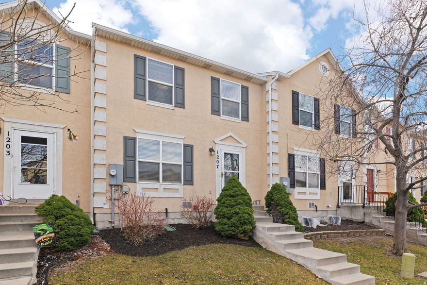 OPEN HOUSE SATURDAY 3/14/26 12:00 - 2:00. Welcome to this charming two-story townhome nestled beside  the serene Willow Pond, where you can relax while watching the geese and the occasional squirrel wander by. Bright and open with numerous updates throughout, the kitchen features brand-new stainless steel appliances (refrigerator included) and a breakfast bar with a new granite island countertop. Step outside to a spacious, fully vinyl-fenced backyard with maintenance-free grass cared for by the HOA. Inside, you'll find wood-style laminate flooring, new carpet, three bedrooms, and two full bathrooms. The newly finished basement offers a large recreation room and a full-size utility room with durable epoxy floors. Located in a quiet, secluded community with convenient access to I-215, this home provides an easy commute to downtown, the canyons, and anywhere in the valley. Square footage provided as a courtesy and obtained from county records. Buyer to verify all information provided.