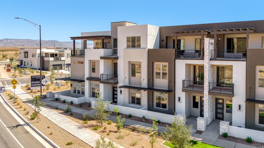 Discover the Pacific II, a standout in the acclaimed Desert Color community, offering 3,605 square feet of living space. With 5 bedrooms, 5.5 bathrooms, and a 1-car garage, this townhome boasts a gourmet kitchen, built-in banquette, and mini bar for the ultimate vacation. Bunk rooms ensure plenty of space for larger groups, while the second-floor deck, complete with a hot tub and fire table, provides the perfect spot to unwind after a day of adventure in Southern Utah.