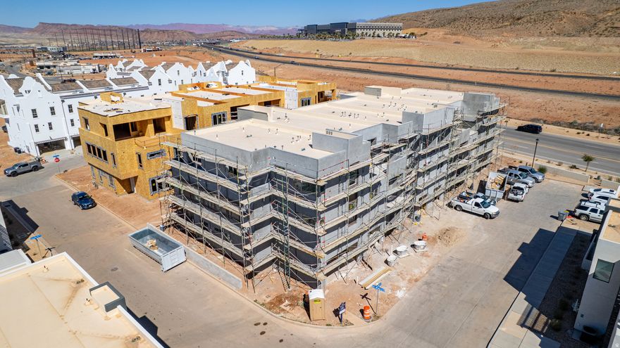 Discover the Pacific II, a standout in the acclaimed Desert Color community, offering 3,605 square feet of living space. With 5 bedrooms, 5.5 bathrooms, and a 1-car garage, this townhome boasts a gourmet kitchen, built-in banquette, and mini bar for the ultimate vacation. Bunk rooms ensure plenty of space for larger groups, while the second-floor deck, complete with a hot tub and fire table, provides the perfect spot to unwind after a day of adventure in Southern Utah.