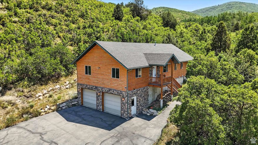 Opportunity is knocking are you ready to answer? Brand new roof, new kitchen appliances, upgraded electrical outlets, oversized 4 car garage, great location in Timberlakes, year round access with paved driveway. This is truly a one-of-a-kind filled with endless possibilities .