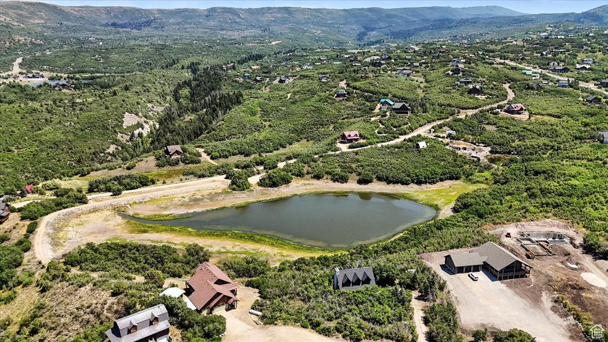 Opportunity is knocking are you ready to answer? Brand new roof, new kitchen appliances, upgraded electrical outlets, oversized 4 car garage, great location in Timberlakes, year round access with paved driveway. This is truly a one-of-a-kind filled with endless possibilities .