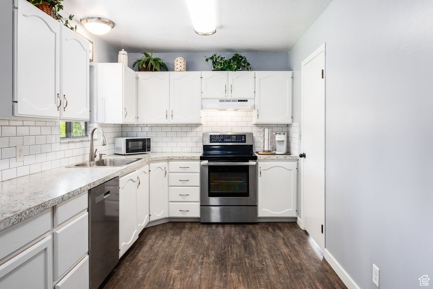 Welcome to this beautifully updated 4-bedroom, 2-bath home in the heart of Heber City-just minutes from world-class skiing and recreation at Deer Valley Resort. With no HOA, you'll enjoy the freedom to truly make this home your own. The home offers excellent flexibility with the option to separate into two living spaces: the downstairs features 2 bedrooms, 1 bath, and its own private entrance, making it ideal for guests, extended family, or rental potential. Thoughtful updates throughout include a full kitchen remodel in 2019, new upstairs windows in 2020, fresh carpet and flooring in 2023, and a finished basement completed in 2020. Major systems have been taken care of with a new furnace (2023) and new water heater (2025), offering peace of mind for years to come. The yard was revitalized in 2020, creating a perfect outdoor space to relax or entertain. This move-in-ready home combines comfort, versatility, and convenience in one of Utah's most desirable mountain communities.