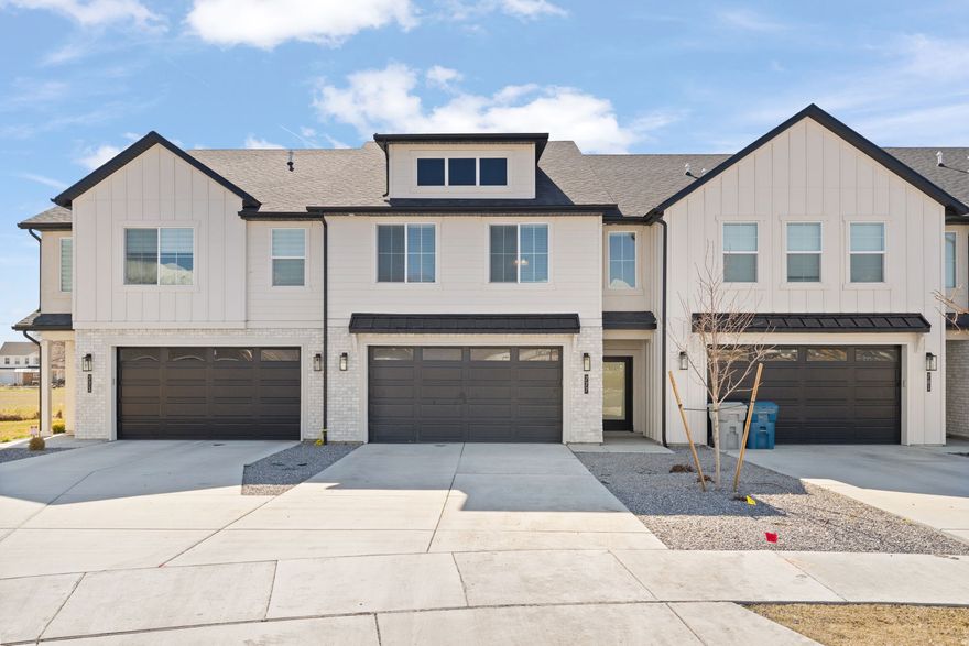 Welcome to this newly built 2,171 sq ft townhome, ideally situated in a quiet cul-de-sac in the heart of American Fork. This 3-bedroom, 2.5-bath home offers modern living with thoughtful design and an oversized driveway for extra parking. Enjoy added privacy and outdoor space as the home backs up to open green space, creating the feel of an extended backyard - perfect for play, relaxation, or entertaining. With quick access to major roads, shopping, and amenities, this property is a great opportunity whether you're looking for a solid investment or a place to call home. Don't miss it!