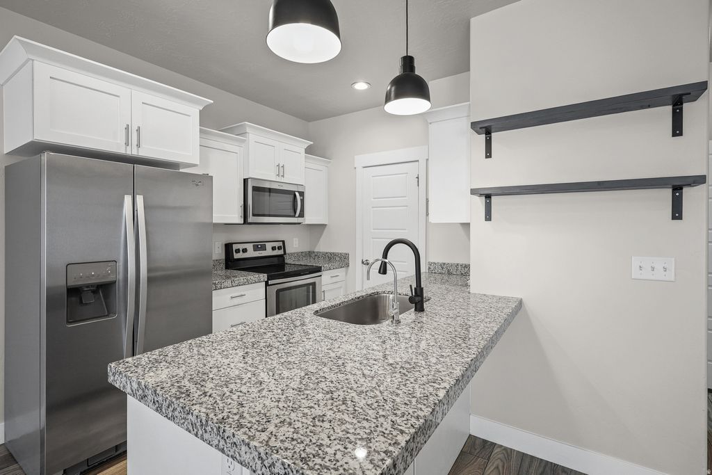 Photo of 7549 N HUTCH LN, Eagle Mountain, UT 84005 (MLS # 2156021)