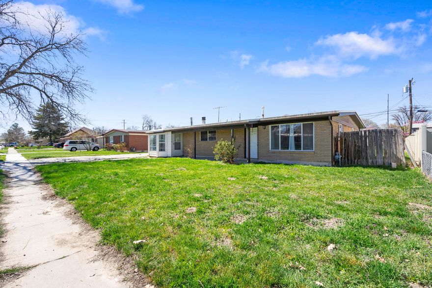 Single-level living in the heart of West Valley City! This 3-bedroom, 1.5-bath home offers comfort, convenience, and functionality all in one. Enjoy a spacious, fully fenced yard and a large 2-car garage complete with an automatic opener, providing ample storage and ease of access. This home features central air with a Honeywell smart thermostat.  Ideally located just minutes from TRAX, shopping at Valley Fair Mall, dining, and quick freeway access, this home also offers an easy commute to Salt Lake International Airport and surrounding areas. This home has Utopia Fiber Optic internet lines that are fully paid for!  Come enjoy the high speed of 250 mega bits per second for just $41 dollars per month.   Sellers are having a new fence installed in April on the North side of the home.  Don't miss out on your opportunity for low-maintenance, single-level living in a highly convenient location-schedule your showing today!