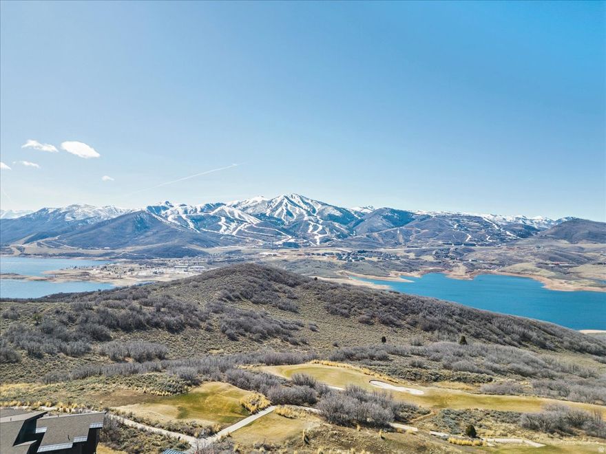 Premier 0.52-acre homesite in Hideout showcasing sweeping views of Jordanelle Reservoir, Deer Valley's new East Village, and Mount Timpanogos, ideally positioned along the 2nd hole of the Outlaw Golf Course. Direct access to nearby walking and biking trails and just minutes to world-class skiing and year-round recreation. Build your custom home to capture panoramic ski slopes and mountain views. Only 10 minutes to Park City's renowned dining, shopping, and historic Old Town. Hideout HOA includes common area landscape maintenance, trail upkeep, utilities, reserve fund, and more. All information is deemed reliable but not guaranteed. Buyer to verify.