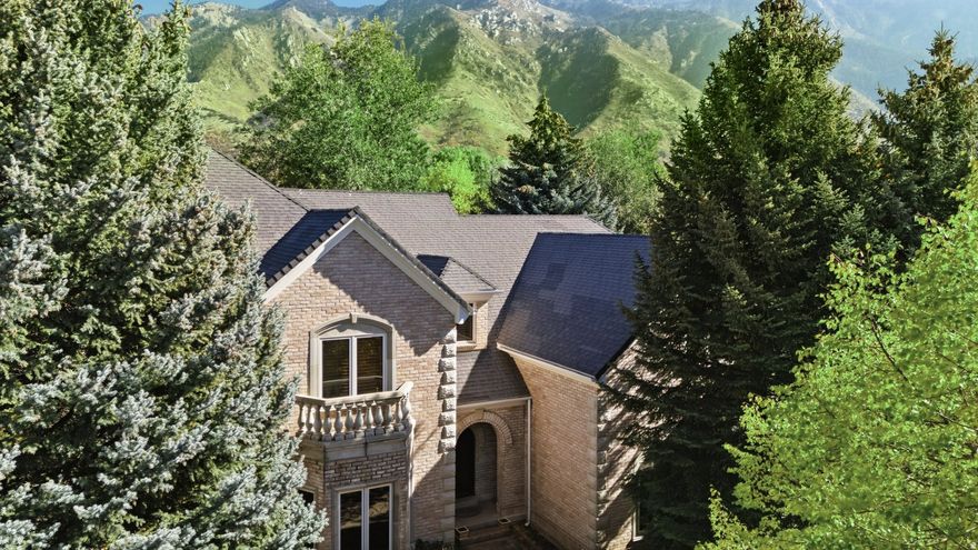 *Rarely Available is this Backyard East Facing Spectacular Mountain View Property, One Owner all Brick Custom 2 story. Discover an unparalleled lifestyle in the coveted 24 hr guard gated 477 acre Pepperwood community, boasting an array of amenities including the pool, spa, large splash pad, lifeguards, competition swim team, sand volleyball, tennis, basketball and pickleball courts, playground/park, walking/biking trails, and Year-round Events that include 4th of July parade, Easter egg hunt, High school graduation party and food truck nights. The Pepperwood Community sets the stage for an active and vibrant lifestyle, fostering a strong sense of community. Just outside the Pepperwood Community you are conveniently located within minutes of more hiking and biking trails, world-class ski resorts, recreational activities, lakes, shopping, and the international airport. Step inside to an open-concept layout that balances expansive gathering spaces with intimate private retreats. Soaring ceilings, rich custom millwork, and walls of windows bathe each room in natural light . The kitchen, dining and great room areas are perfect for hosting both casual family evenings and formal gatherings. The home's thoughtful design continues with an extra large primary bed/bath suite that functions as a true sanctuary, offering a generous walk-in closet. Each additional bedroom and guest suite is designed with comfort and privacy in mind. The oversized main floor office can be a large bedroom with large walk-in closet and double doors accessing to the private back yard. The Daylight lower level provides endless opportunities for entertainment backyardation-with a second oversized Primary Bed/Bath suite, theater room, fitness area, and spacious recreation zone. Retreat to your wooded, east facing, private back yard and with the removal of a few trees you will find spectacular unobstructed mountain views .Buyer to verify All information and sq footage. For appts call Co-Agent/Shelly Tripp and she has key to let you in and must be at all showings.