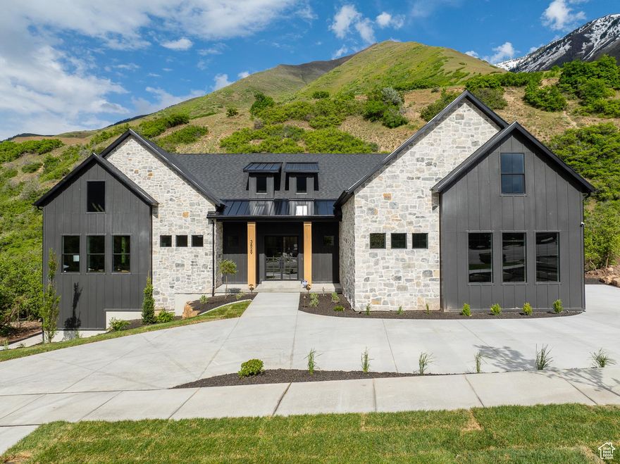 Set at the base of Maple Mountain, this custom home offers an exclusive retreat with small-town charm and breathtaking mountain views. Designed for uncompromising quality and meticulous craftsmanship, it is a testament to sophisticated living in Mapleton.Excavation October 2025. Expected Completion late Summer 2026. Photos represent renderings and how it was completed in previous builds.