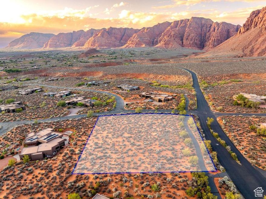 Rare Corner Lot with spectacular panoramic views in Kayenta. Discover one of the most premium building opportunities of its size and proximity. Up close and intimate with the red rocks and landscape, being able to see the cascading wateralls right from your dream home! This exceptional corner lot offers privacy and expansive, unobstructed views of the red mountains and desert landscape that define Southern Utah's beauty. Positioned perfectly to capture breathtaking sunrises and golden-hour mountain glow. Located minutes from Kayenta Art Village, Tuacahn Amphitheatre, and endless hiking and biking trails, this lot offers the perfect balance of entertainment, culture, and adventure. Enjoy the serene lifestyle of the desert while still being close to dining, golf, and community amenities.