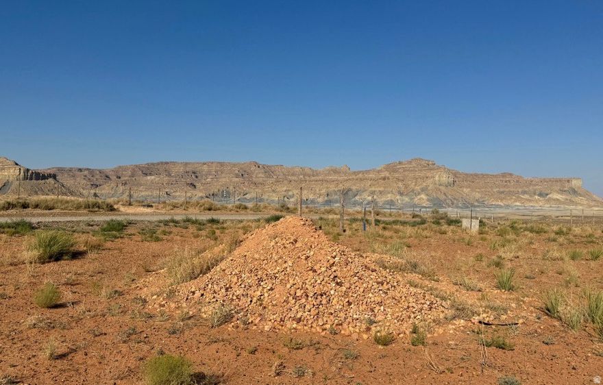 Come check out this commercial buildable lot. This lot is designed for commercial use, apartments and more. Call the planning and zoning department to confirm your dream plans for your build. This lot has great view of the bluffs and Lake Powell while being located just off of the highway for great visibility.