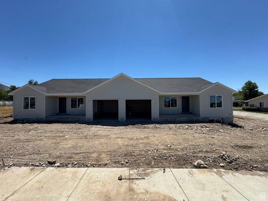 New legal duplex. This is a great opportunity to buy an investment property. Live in one side and rent out the other. Currently under construction with an estimated completion date of August 1st. This is a side by side duplex with 3 bedrooms, 2 bathrooms and 1 car garage on each side. Both sides have a large unfinished basement.