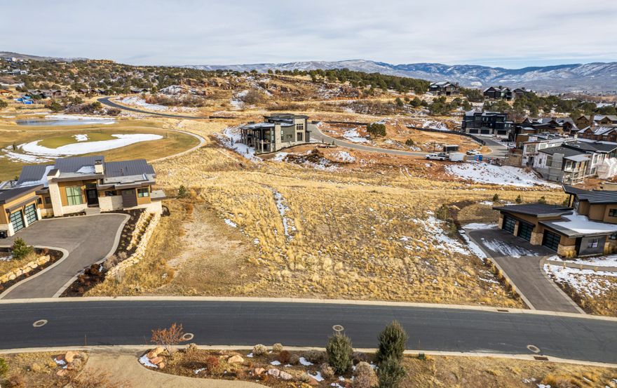 Build your dream home in the prestigious gated community of Red Ledges in Heber City. This exceptional half-acre homesite features flat, builder-friendly terrain and beautiful golf park views, ideally positioned near the west gate for easy access to Heber Valley, Midway, and Park City. Professionally engineered plans are included, giving you a strong head start while still allowing flexibility to tailor the design to your vision. Enjoy the privacy, scenery, and elevated lifestyle Red Ledges is known for, with access to top-tier amenities, year-round recreation, and endless hiking and biking trails. Whether you're planning a refined primary residence or a luxurious mountain retreat, this property delivers an outstanding opportunity in one of Utah's most sought-after private communities.