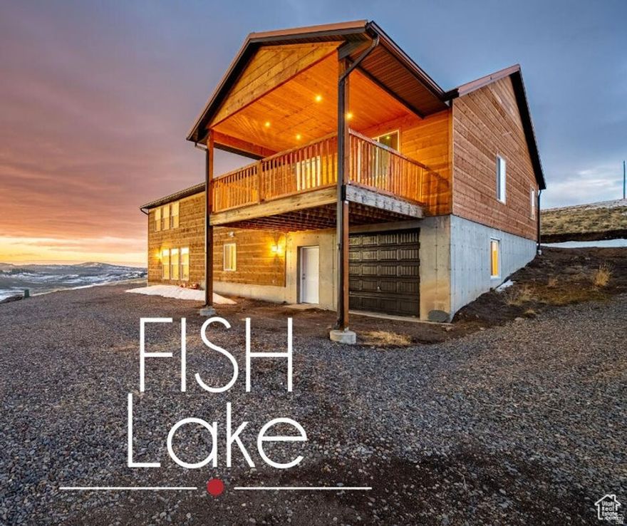 Your own slice of mountain paradise just a couple miles from Fish Lake, one of central Utah's most beloved high-country destinations. Nestled just outside the basin within Fish Lake National Forest, this property offers year-round access to boating, fishing, hunting, hiking, snowmobiling, ice fishing, snowshoeing, and extensive ATV trails-making it the perfect four-season retreat.  Currently operating as a successful short-term rental, this property presents an excellent investment opportunity with income potential. Contact the listing agent for detailed financial information and see how this mountain getaway can help pay for itself.  Crafted from Texas White Pine Cedar and thoughtfully designed to accommodate large groups, the home offers generous parking for vehicles and recreational toys, along with expansive indoor gathering spaces. Main/entrance level has large family room with beautiful views from all angles as well as 5 bedrooms, 2 baths, a laundry room, and a kitchenette.  Downstairs has an additional bedroom, a bathroom, a large updated kitchen, game room, and lots of storage.  Highway 25 is maintained year-round by Utah Department of Transportation, leaving only the short private driveway to self-manage for full seasonal accessibility.  The property also includes a 300-gallon water trailer for easily filling the 2,500-gallon basement water tank-providing reliable year-round water storage. Furniture is included, allowing for a seamless transition into personal use or continued rental operation.  Whether you're looking for a personal mountain escape, an income-producing property, or both, this stunning retreat offers the best of all seasons in one exceptional location.