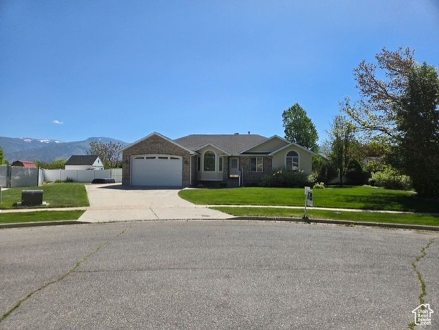 Huge Price Drop! All Reasonable Offers Considered! Welcome home to this spacious 4-bedroom, 3-bath beauty offering approximately 3,295 sq. ft. of versatile living space! Designed for comfort and flexibility, this ranch-style home features two full kitchens, two family rooms, and a large bonus room-perfect for a game room, home theater, or additional bedroom. The primary suite is a private retreat with a jetted tub. Two additional full bathrooms-each with their own jetted tubs-offer convenience for family and guests. Enjoy cozy evenings by one of the three fireplaces or unwind in your very own sauna. Nestled on a quiet cul-de-sac, this home provides peace, privacy, and room to spread out. Step outside to your fully landscaped backyard featuring a fence with private gate access directly to the neighborhood park! It's perfect for outdoor entertaining, pets, and play. Additional highlights include a two-car garage, RV parking, and a spacious 0.37-acre lot offering plenty of room for outdoor living or future expansion. With an incredibly low $13/month HOA fee (covering park maintenance only), this home offers exceptional value and versatility. Spacious. Comfortable. Connected to nature. Don't miss your chance-schedule your private tour today!  Some pictures have been digitally altered to show flooring possibilities.