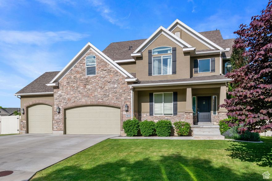 Beautifully maintained home with breathtaking views in a quiet gated community. Enjoy living across the street from a private neighborhood park and playground, set against the majestic backdrop of the Wasatch Mountains. Take in unobstructed views of the Mount Timpanogos Temple from both the backyard and large picture windows in the family room and master bedroom. Inside, you'll find warm, newly refinished hardwood floors throughout the main level, fresh paint, and gas fireplace. The kitchen is thoughtfully designed with granite countertops, stainless steel appliances (all included), and ample cabinetry-perfect for everyday living and entertaining. Upstairs, the spacious master suite features vaulted ceilings, a jetted tub, dual vanities, and two walk-in closets. The beautifully landscaped yard offers unmatched privacy with no rear neighbors and includes mature trees, a fruit-bearing pear tree, raised garden boxes with drip irrigation, and a charming playset. The 3-car garage features an extra-tall third bay-ideal for oversized vehicles or additional storage. The fully finished basement includes an extra bedroom and two generous storage rooms. Conveniently located within walking distance of American Heritage School, Lincoln Academy, and the Mount Timpanogos Temple, and just a short drive to hiking and camping in American Fork and Provo Canyons. This home offers the perfect blend of comfort, convenience, and community in an extraordinary setting. Come see it today!