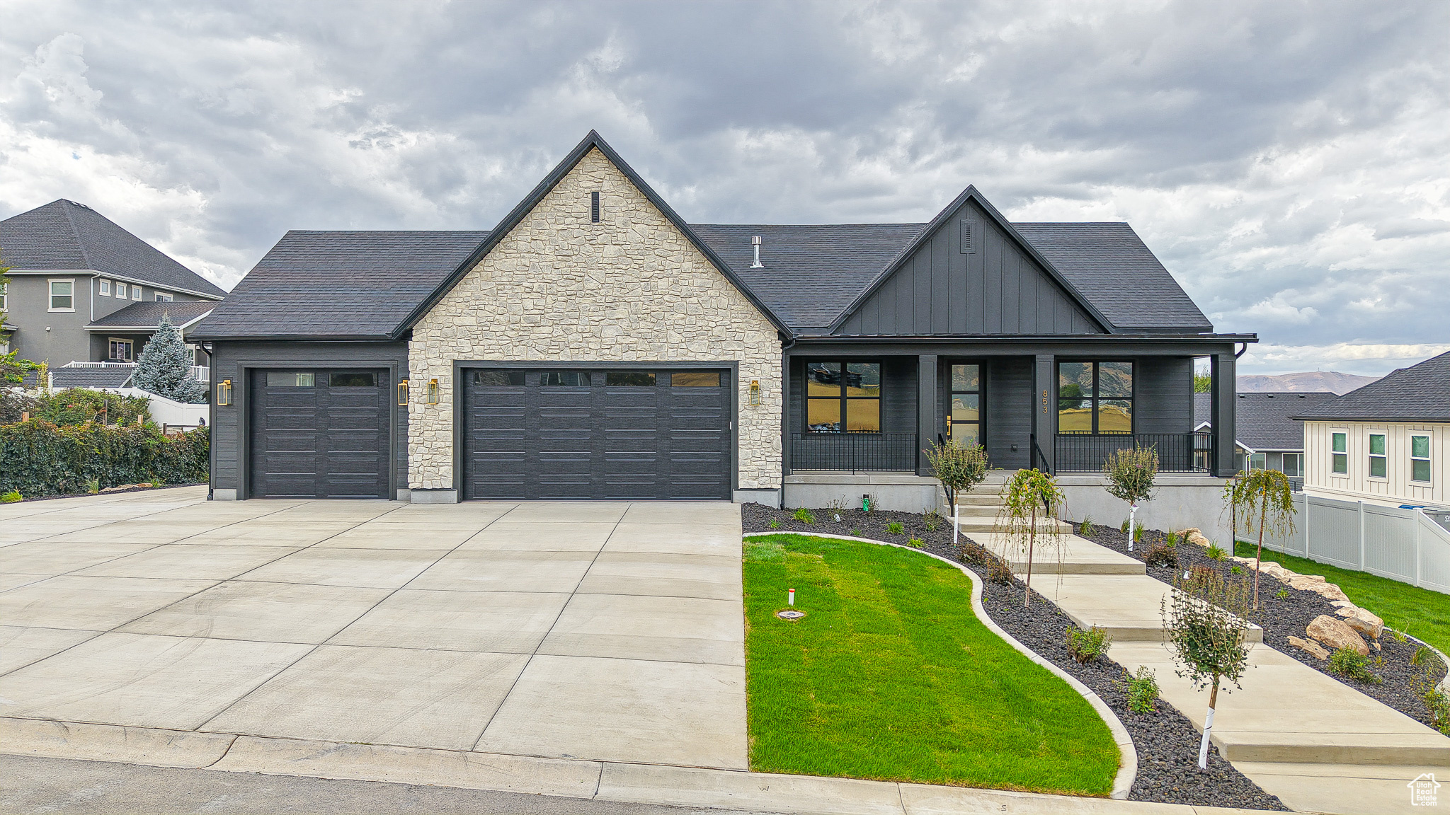Be sure to click on the tour button to see the 3D tour. Nestled in a serene, quiet neighborhood, this stunning 7-bedroom, 5-bathroom fully custom home, built in 2025, offers 5,040 square feet of luxurious living space with breathtaking mountain, lake, and valley views. This residence has a chef's kitchen, featuring high-end appliances and exquisite finishes. Features and upgrades include, quartz countertops, double ovens with a separate cooktop, vented hood, LVP throughout, custom modern railings, 9ft ceilings on the main and basement, large shower with double shower heads and a rainfall, separate tub, double vanities, spacious walk-in-closet, large pantry, large covered deck, vaulted ceilings and recessed lighting throughout. The fully landscaped grounds enhance the property's charm, complemented by convenient RV parking. A versatile basement apartment with separate entrance provides additional living space or rental potential.