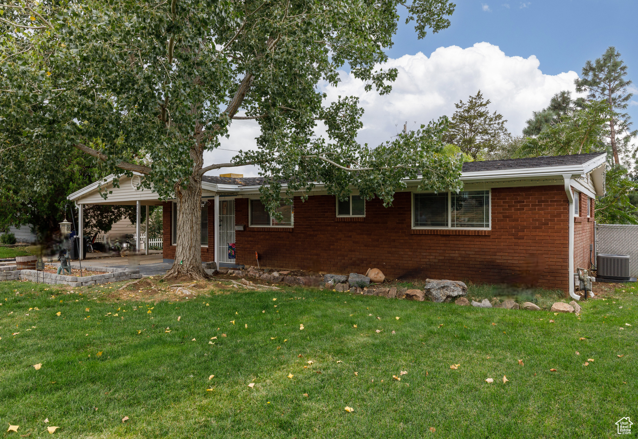 This home is the perfect blend of classic charm and modern updates! Tucked into Ogden's East Bench, 915 Hislop Drive is a 3-bedroom, 2-bath, 1,651 sq. ft. single level living rambler that has been thoughtfully remodeled inside and out. Originally built in 1954, the home has seen major upgrades in the last five years, including a brand-new AC, kitchen appliances, RO water in kitchen, Shed with power, updated interior plumbing, new fireplace insert, water heater, water softener, a spacious new deck with pergola, and leaf guard gutters. Inside, you'll find engineered hardwood floors, updated bathrooms, and a bright open-concept living space designed for gatherings. The oversized master bedroom features French doors leading to the backyard retreat. Step outside to enjoy your sunsets, mature landscaping, and two storage sheds - all with gorgeous mountain views from the front and sweeping vistas to the west. This home is move-in ready and offers the comfort of single-level living in a peaceful neighborhood. The covered carport offers additional storage and parking for toys and vehicles.