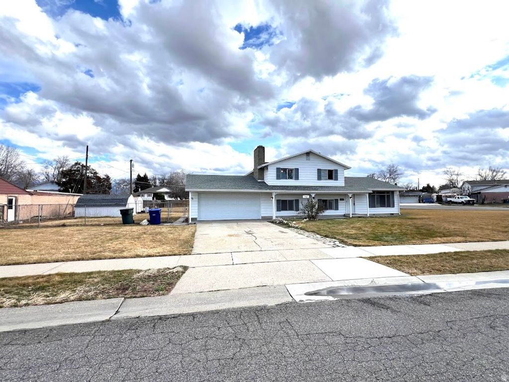 Photo of 3887 S HALLMARK DR, West Valley City, UT 84119 (MLS # 2153596)