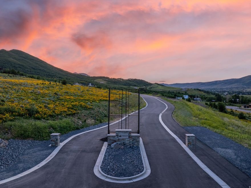Set high above Pineview Reservoir with sweeping views of the valley and surrounding peaks, this premier homesite in Eden, Utah offers an extraordinary opportunity to create your ideal mountain-modern retreat. Nestled within an intimate, private enclave of just 24 thoughtfully planned lots-each spanning 1 to 1.56 acres-the community pairs refined architectural vision with the unfiltered beauty of its natural landscape. Here, adventure and tranquility meet. Snowbasin and Powder Mountain are less than 20 minutes away, and Nordic Valley is just a nine-minute drive. When the snow melts, the area transforms into a summer playground: hike nearby trails lined with wildflowers, or simply cross the street to North Arm Beach for paddleboarding, fishing, and lakeside relaxation. More than a homesite, this is an invitation to elevated living in one of Utah's most breathtaking mountain destinations. All property information, boundaries, and documents to be verified by buyer.