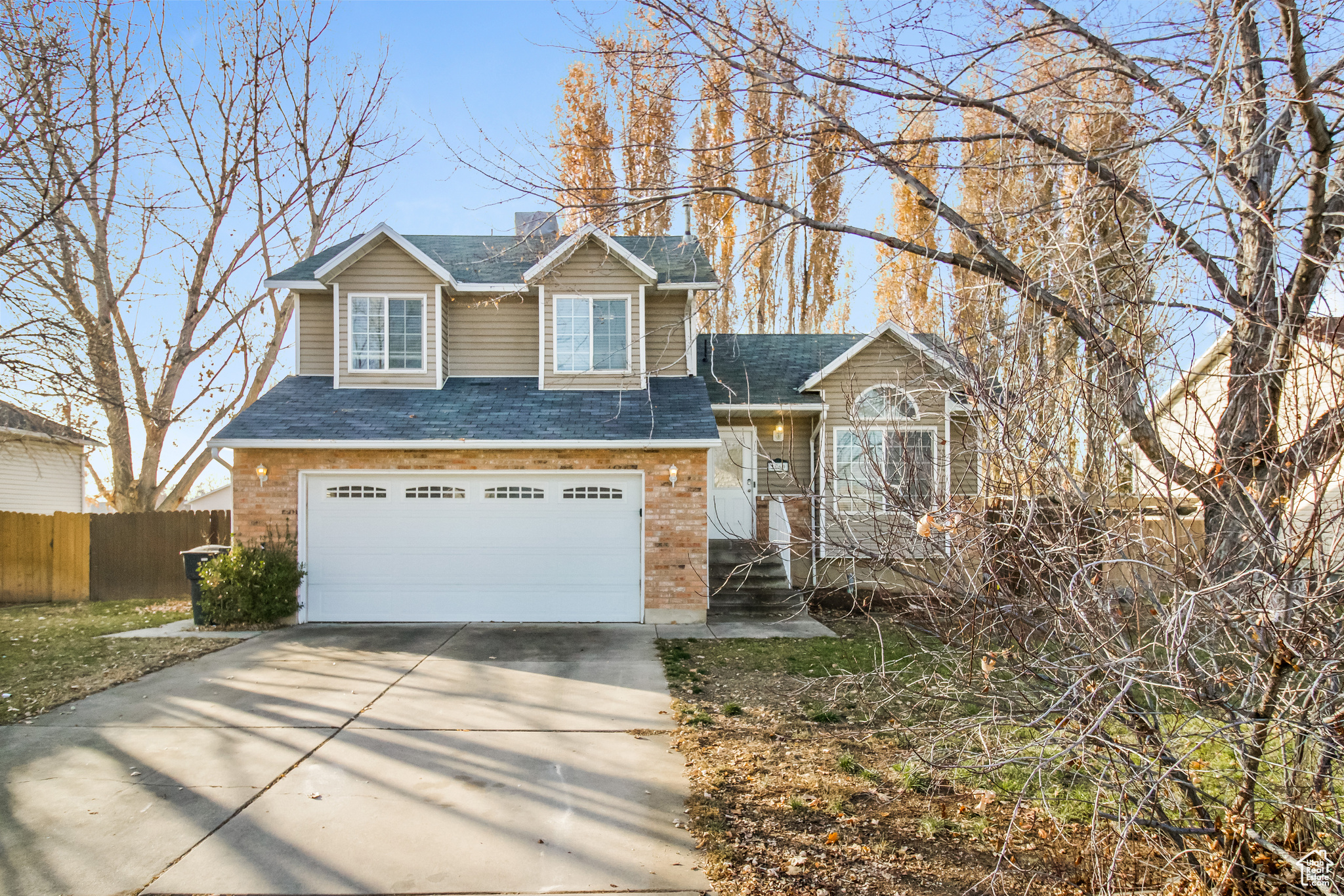 Discover tranquility in this spacious 5-bedroom, 3-bathroom home nestled in a serene Clinton neighborhood. Boasting 1977 square feet of living space, this residence offers a 2-car attached garage and a convenient shed for extra storage. Enjoy the privacy of a fully fenced backyard with a deck, perfect for outdoor relaxation. Situated near schools, I-15, HAFB, and shopping areas, this home combines comfort with accessibility, making it an ideal choice for families seeking both convenience and peace of mind.