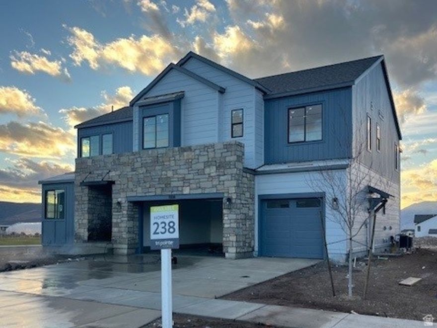 TRIPOINTE QUICK MOVE-IN HOME on lot 238! Experience stunning views of Mt. Timpanogos in the peaceful community of The Crossings at Lake Creek. Whether you're relaxing on the covered patio, unwinding in the expansive great room, or retreating to the elegant primary suite, you'll be surrounded by natural beauty. The chef-inspired kitchen, featuring an oversized island, is ideal for hosting and entertaining. Designer-selected finishes by an award-winning team bring style and sophistication, enhancing the home's serene setting. This thoughtfully designed home offers four spacious bedrooms, 3 and a half beautifully finished bathrooms, a separate office, and an unfinished basement ready for your personal touch. Square footage figures are provided as a courtesy estimate only and were obtained from Builder. Buyer is advised to obtain an independent measurement.