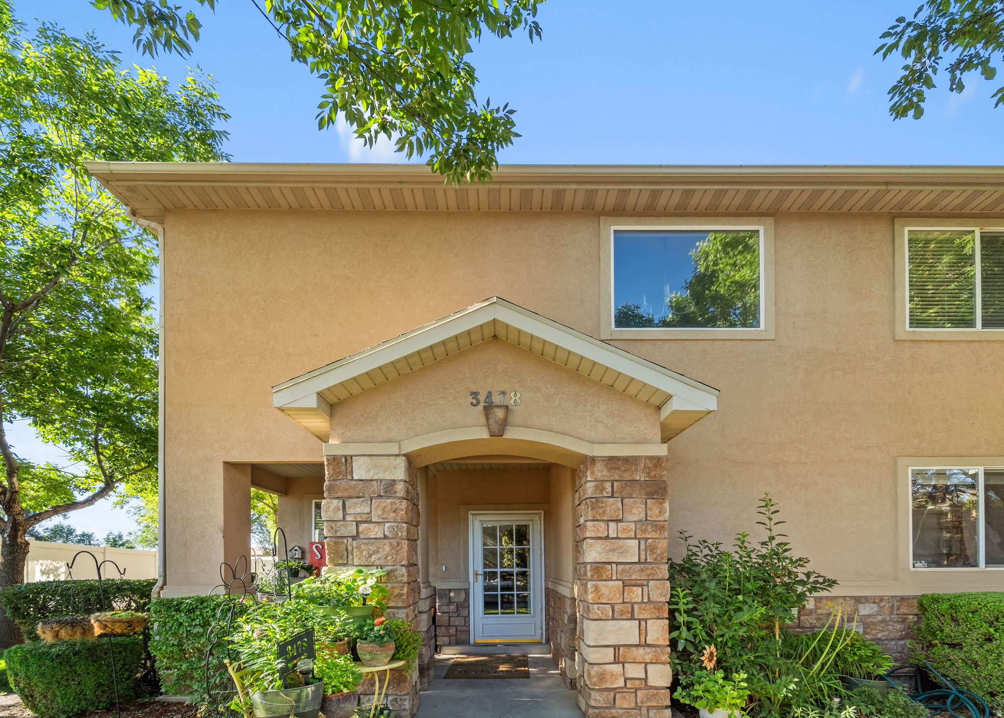 Covered front entry with Stone accent
