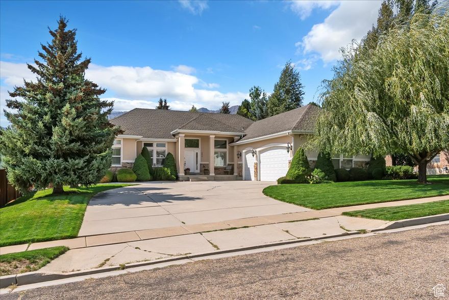 Spectacular home located in an amazing subdivision surrounded by stunning views! Spacious and thoughtfully designed floor plan with tall ceilings and large windows throughout filling the home with natural light, creating an open and inviting atmosphere. Large great room with gas fireplace, updated kitchen featuring stainless steel appliances, ample cabinetry and countertop space, making it a perfect gathering spot. Convenient laundry room with sink and half bath just off of the kitchen adds everyday functionality. The master suite is a true retreat with a walk-in closet, bathroom with double vanity, separate tub and shower, and access to the large partially covered deck. Generously sized bedrooms provide plenty of comfort and flexibility for family or guests. The fully finished daylight basement with a separate entrance includes a full second kitchen, 3 bedrooms, full bath and brings in $1,000 a month as a nightly rental which can help offset costs. (See list of all items included in basement for nightly rental.)  Double furnaces, double A/C units, and double water heaters, spacious 3-car garage with extra width and workbench provides room for vehicles, storage, and projects. This home combines beauty, functionality, and opportunity-all in one incredible setting! Sq. footage per previous listing. All property facts are provided as a courtesy; Buyer to verify all information.