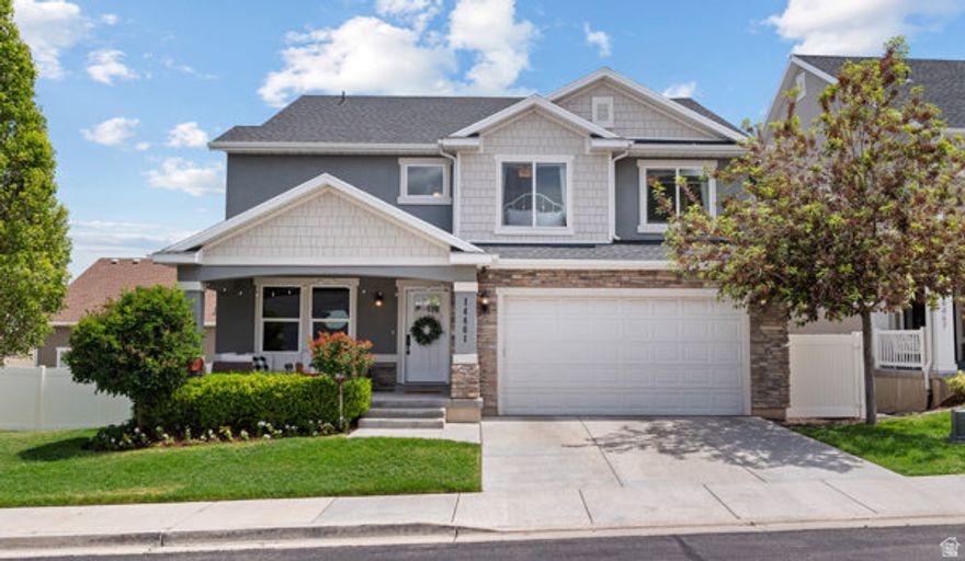 This 5-bedroom, 3.5-bath. 3708 SQ Feet. home refuses to be gloomy. Natural light floods every level- including the walk-out basement and open two-story entry and family room- making even laundry feel slightly less dull. The open-concept kitchen and two-tone cabinetry add just the right amount of personality while still feeling polished. The front room can be an office, music room, or a sanctuary for unopened Amazon boxes. Kids love the under-stair hideout with a pony door and secret wall opening - because every kid needs a secret passage. Outside, enjoy BBQs on the shaded back deck, s'mores by the fire pit, or slow mornings on the front porch. Bonus: extra garage storage for bikes, tools, or a freezer of Costco decisions. Plus, Target and Trader Joe's coming soon-errands just became dangerously convenient.