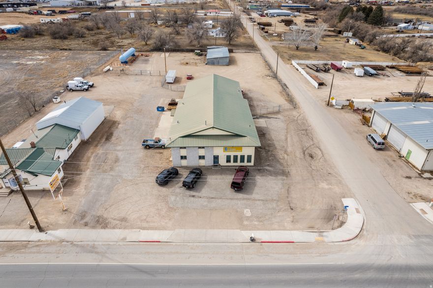 Amazing opportunity to own a fully functioning mechanic shop with Highway 40 frontage. This shop has seven bay doors & six lifts, this shop is completely move in ready. Age of building & square footage figures are provided as an estimate only. Buyer is advised to obtain an independent measurement.