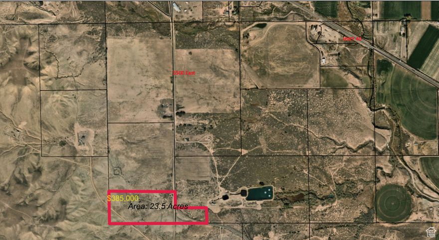Approximately 23.5 acres of light industrial property for sale near the Ashley Valley Industrial Park. Perfect for a storage yard and or shop facility for an industrial company. There is a privately owned oil wellhead on the property located 320 ft west of the 5500 East road. A power line runs to the wellhead and an underground oil  pipeline runs from the wellhead to the south. Owner has obtained a Jensen culinary water connection to the property for potential structure to be built. Please note: Parcel # 06066006 or Parcel# 06067003 have yet to be subdivided. This will happen prior to closing. Also, the fence lines in the photos do not reflect actual property boundary, rather, they do offer a reference point. Additional land may be available, please enquire.