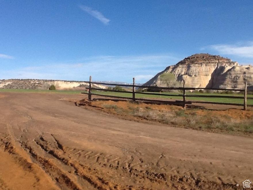 This unique property  has 2 shares of Class A Boulder Irrigation Company included. The well has already been dug and has deeded private road access.  Septic been approved with pump in casing but not installed. Views of The Grand Staircase National monument and  views of the sandstone mesas.